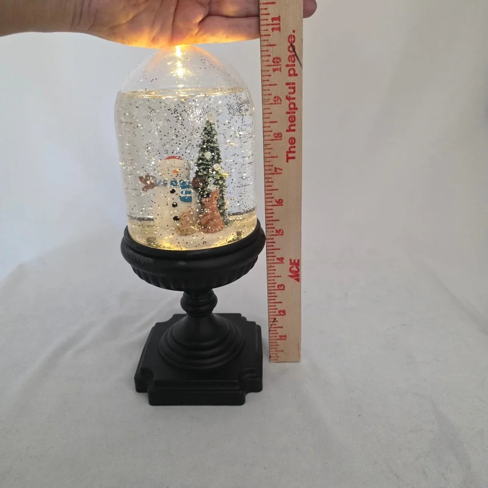 Musical Lighted Snowman & Woodland Bunnies Snow Globe on Black Pedestal Base
